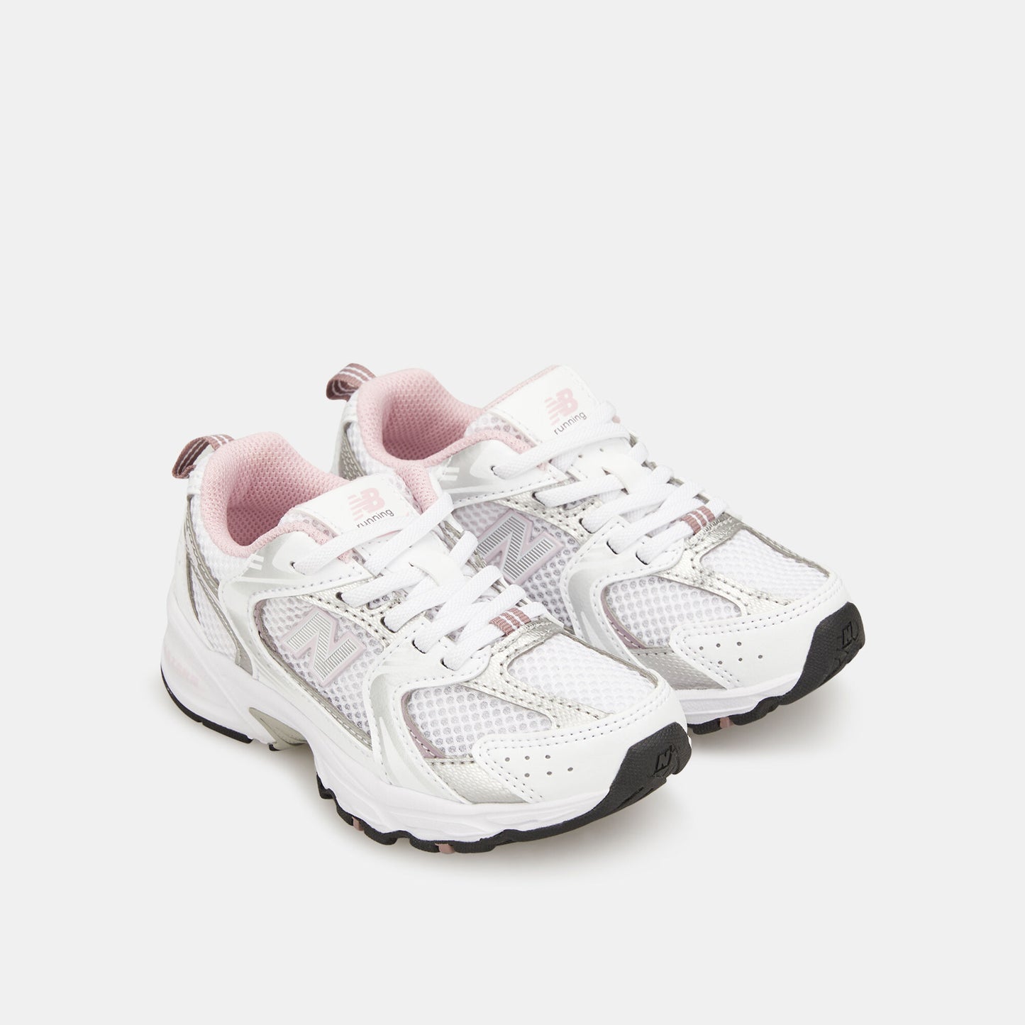 New Balance 530 trainers in white with pink