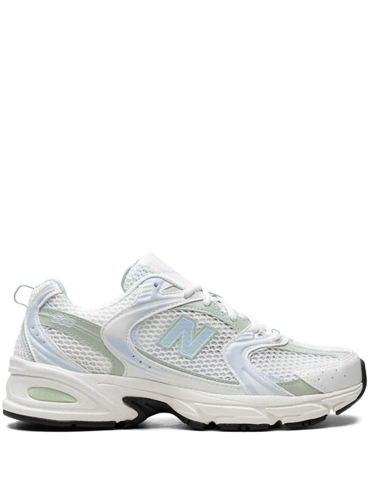 New Balance 530 trainers in white and light blue