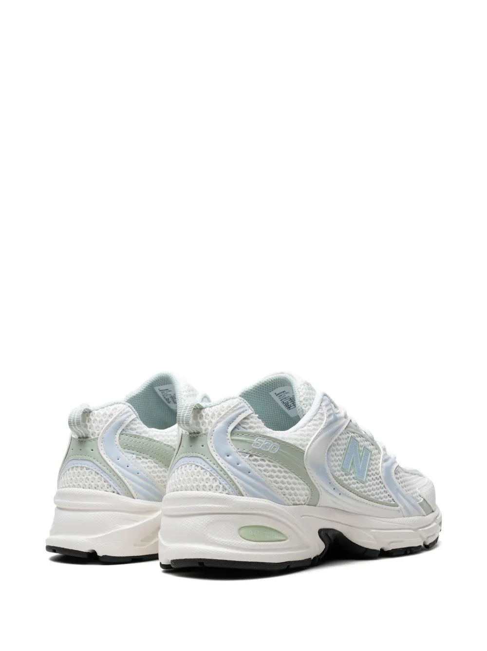 New Balance 530 trainers in white and light blue