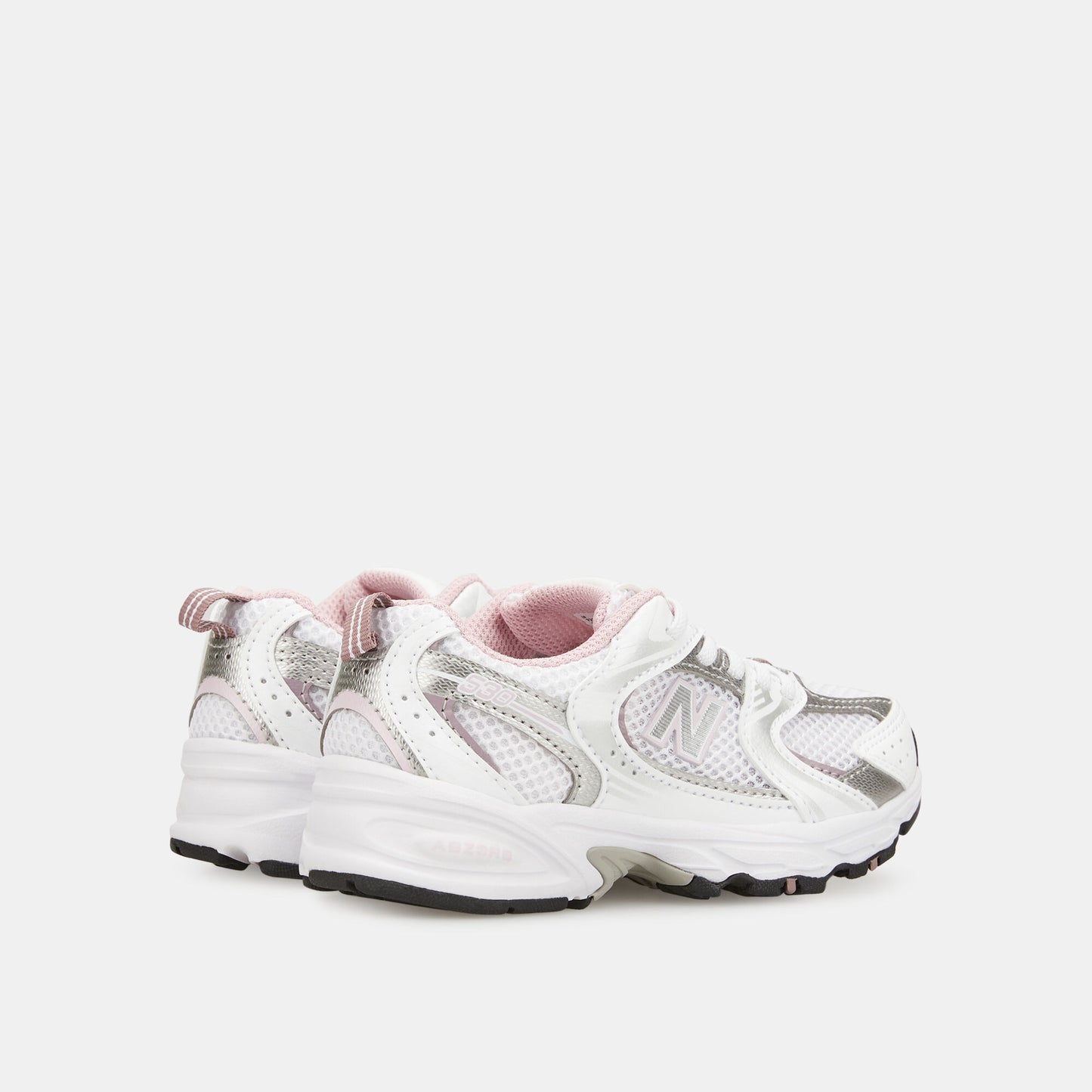 New Balance 530 trainers in white with pink